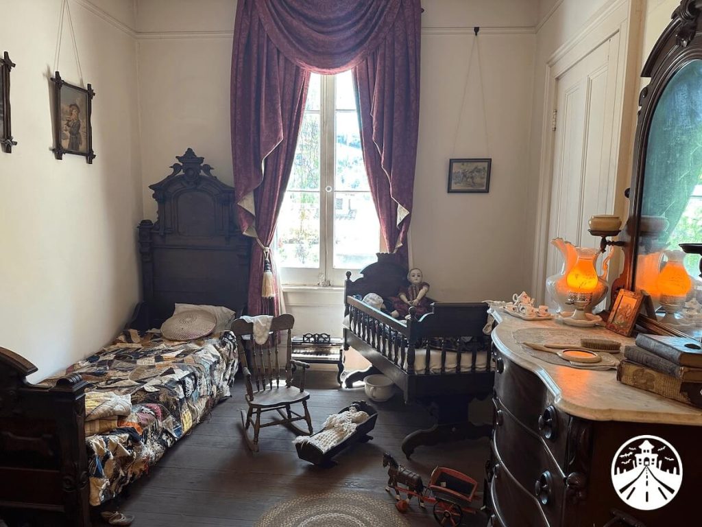 The Whaley House Museum creepy doll in bedroom.