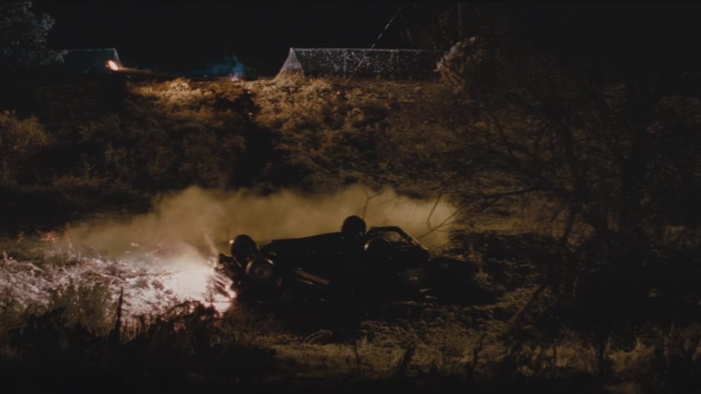 A screenshot from Let Me In showing the car accident.