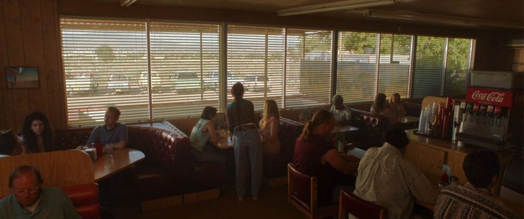 A wide angle shot of Cafe 66 in Love Lies Bleeding