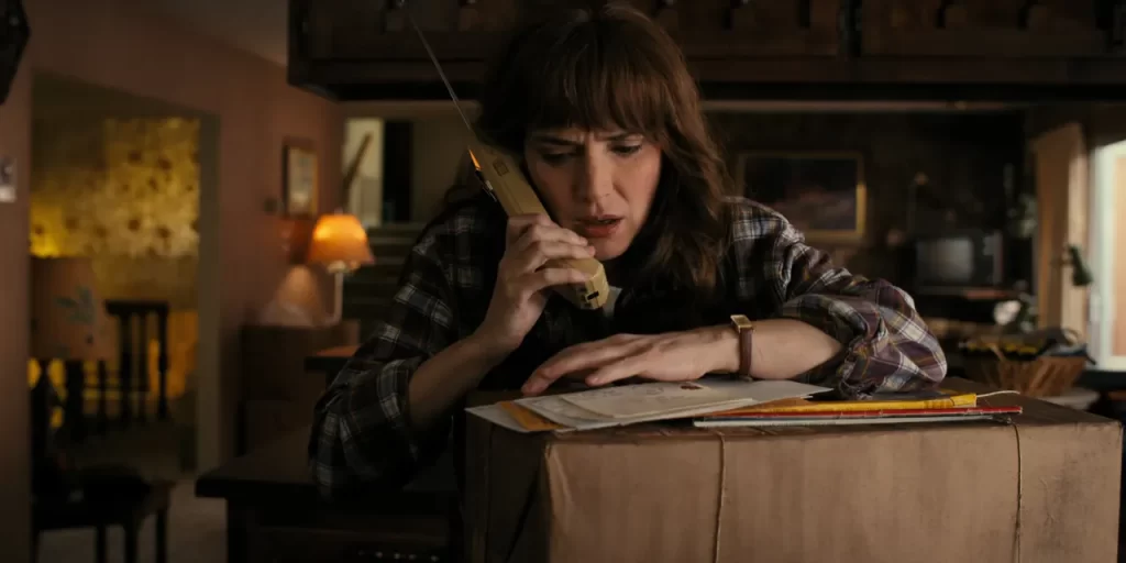 Joyce Byers (Winona Ryder) inside the Byers house in Stranger Things Season 4.